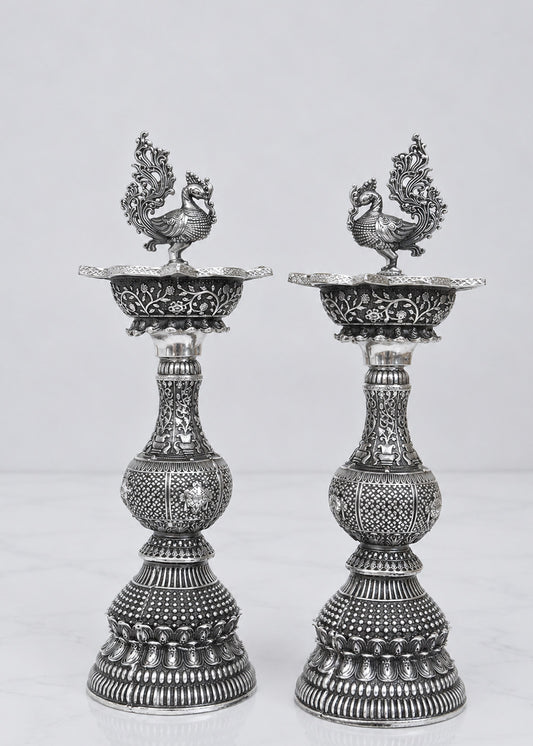 Handcrafted Silver Finish Brass Deepak Stand with Peacock Motif