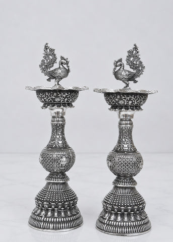 Handcrafted Silver Finish Brass Deepak Stand with Peacock Motif